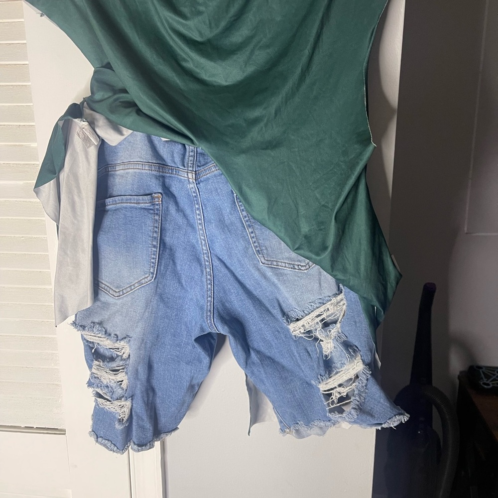Green Top and Distressed Denim Shorts
